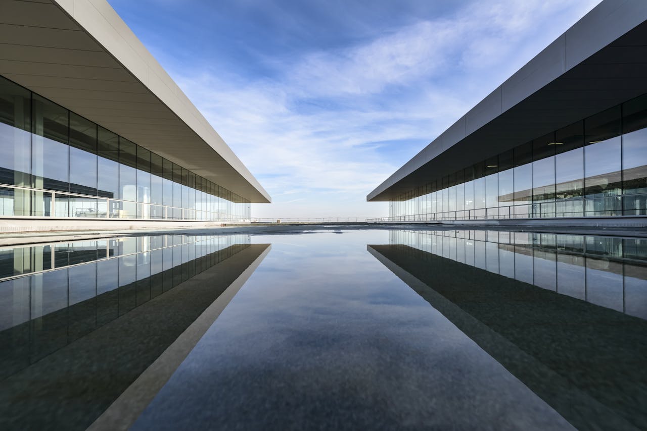 White Building Reflecting on Water